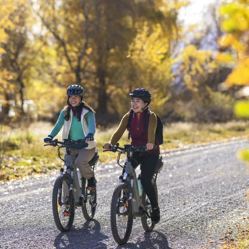 Two bikers riding on the world-famous Alps 2 Ocean Cycle Trail in Canterbury, New Zealand.