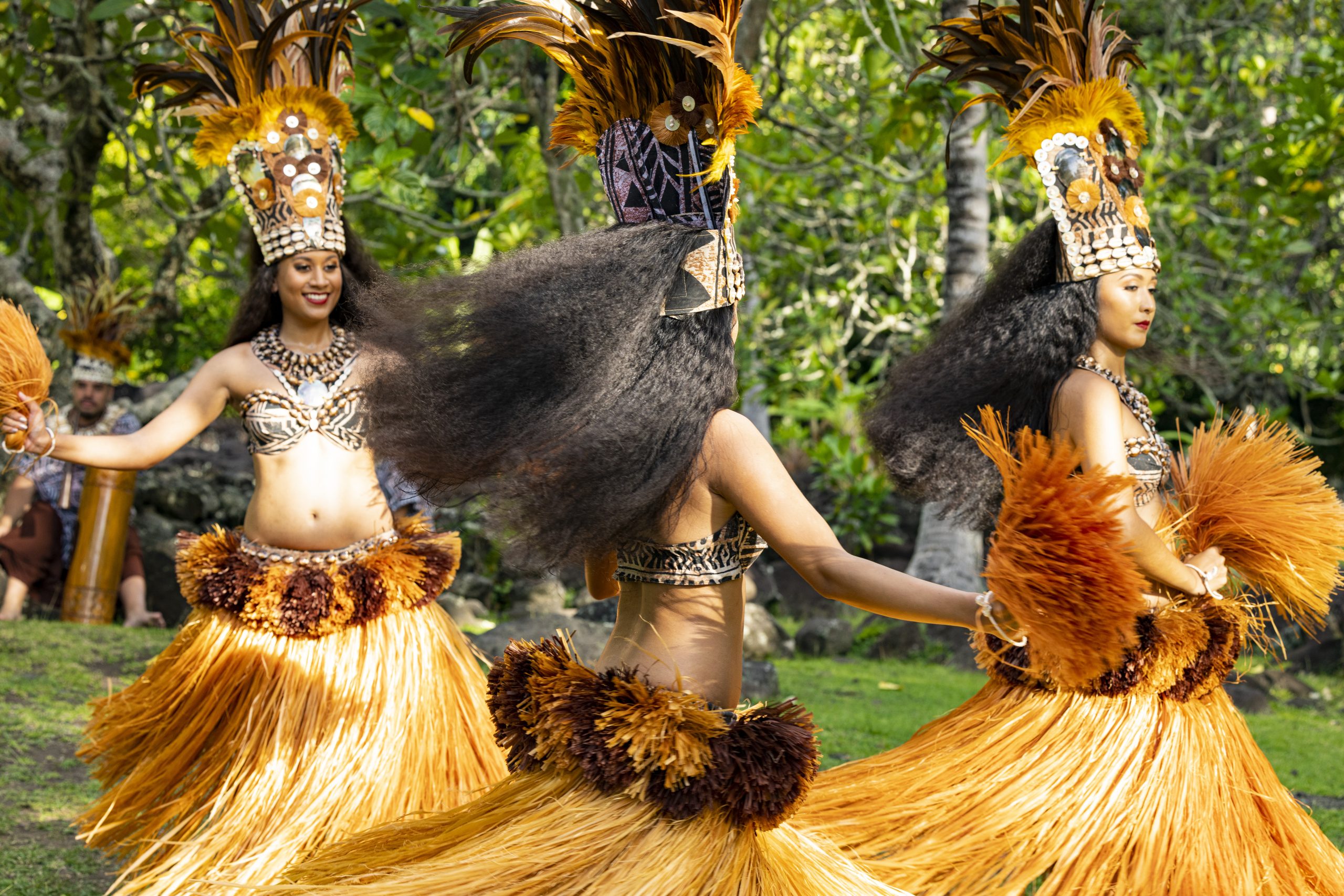 Women in Tahiti performing a traditional dance.