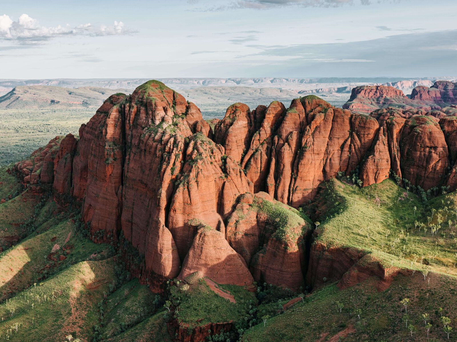 Aerial view of the rugged red gorges and rock formations of the Kimberley, seen from a scenic flight over Western Australia.