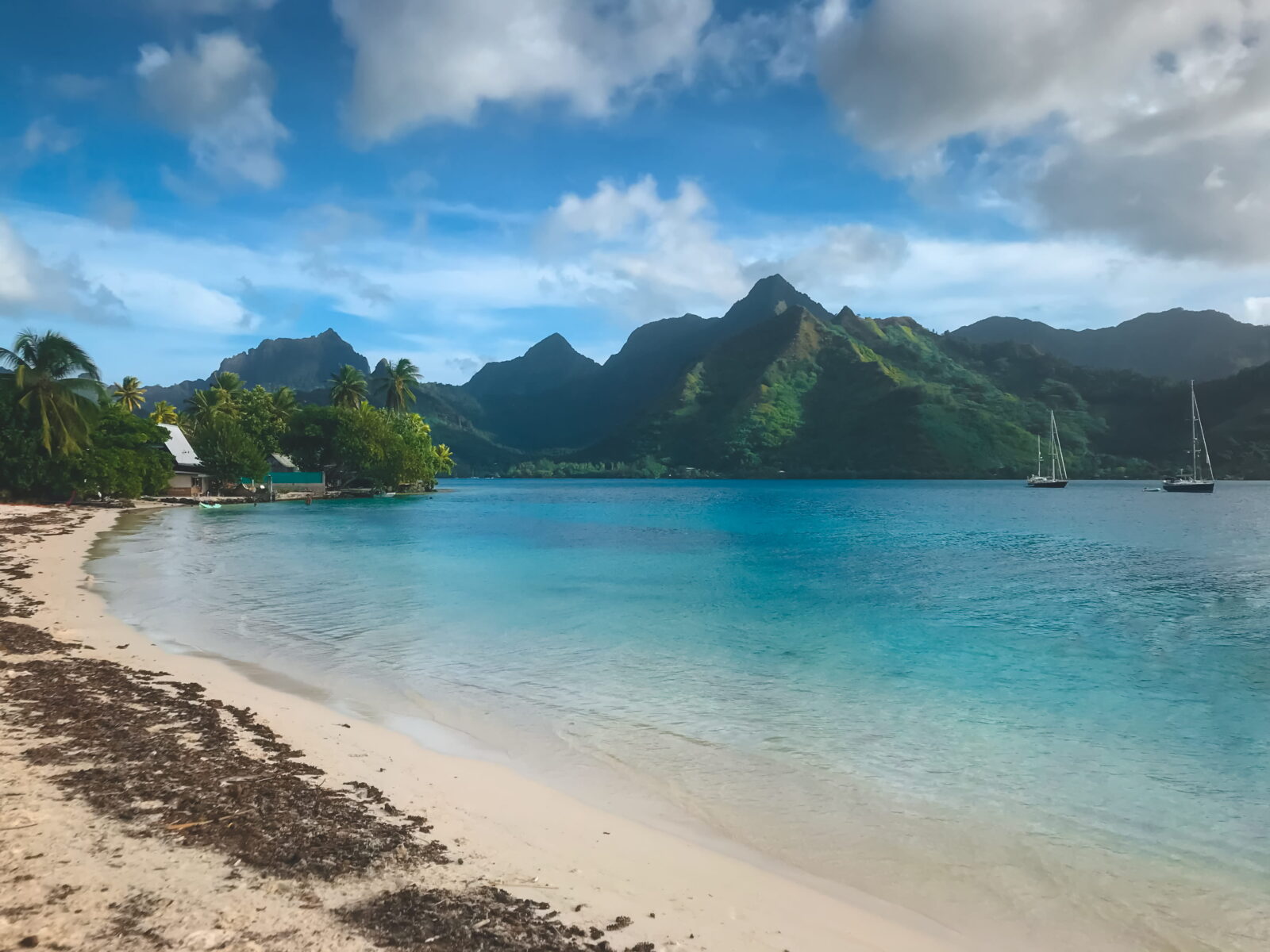 A beach on the north side of Moorea near Opunohu Bay. French Polynesia, South Pacific Ocean.