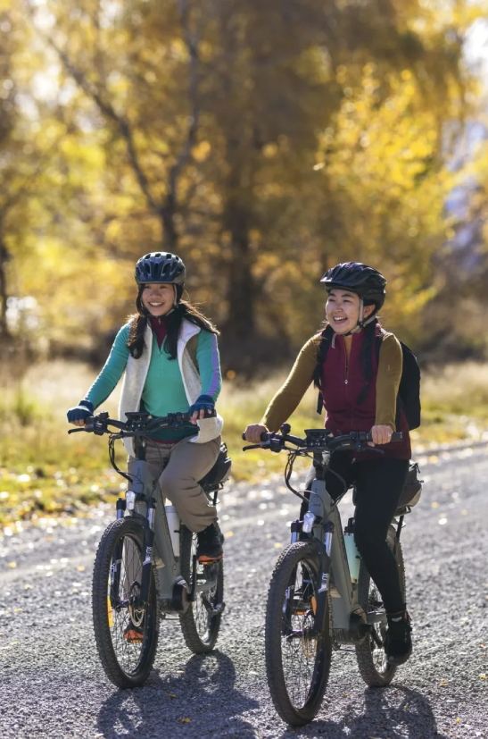 Two bikers riding on the world-famous Alps 2 Ocean Cycle Trail in Canterbury, New Zealand.